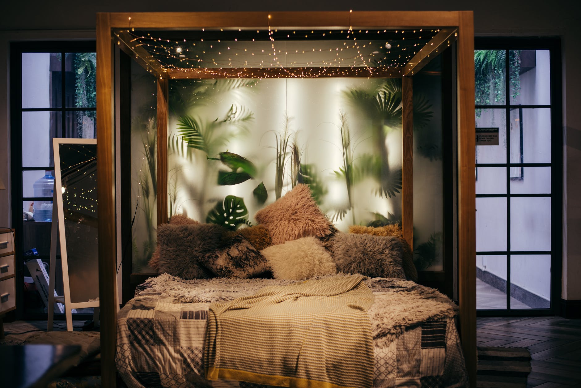 string lights hanged on bed frame