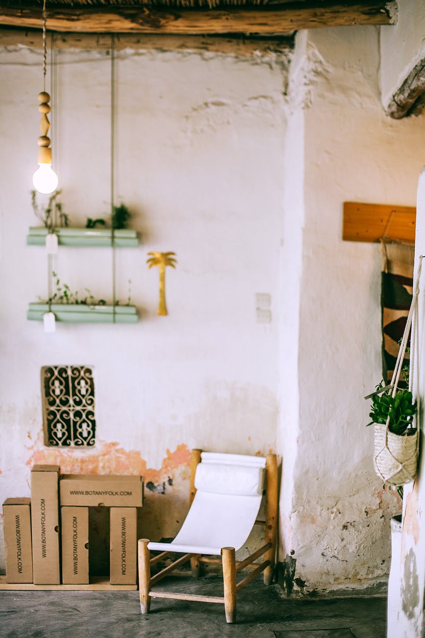 old house interior with shiny lamp and chair