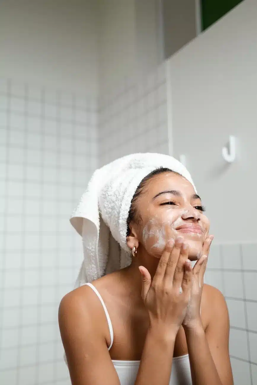 woman washing her face