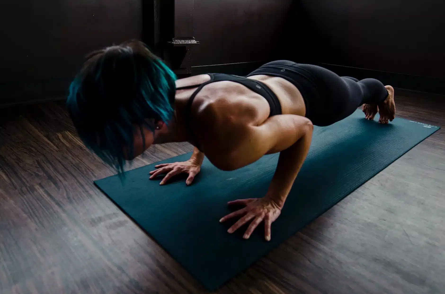 woman doing push ups - Self-Care Rituals