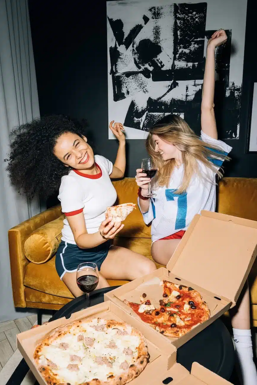 two young women having fun - Relationships During the Holiday Season